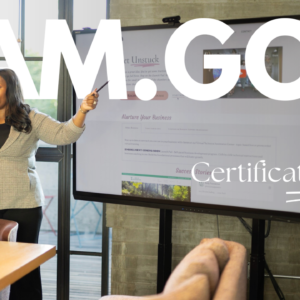 Woman standing and teaching with words sam.gov